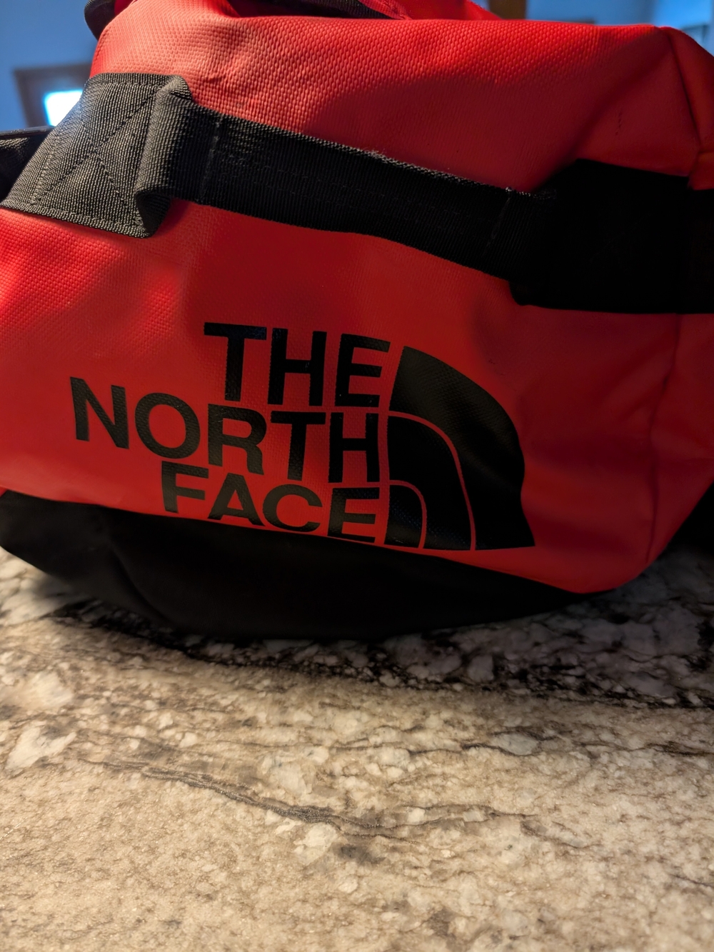 The North Face Red and Black Duffel with Logo
